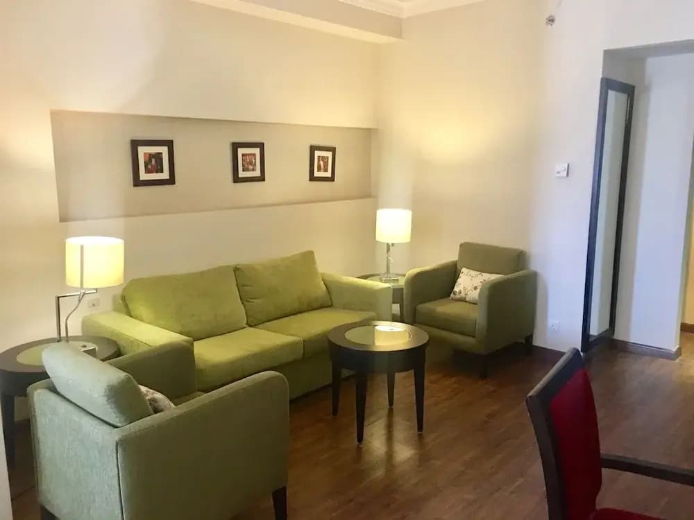 Business Double Suite with balcony and with pool view full double bed