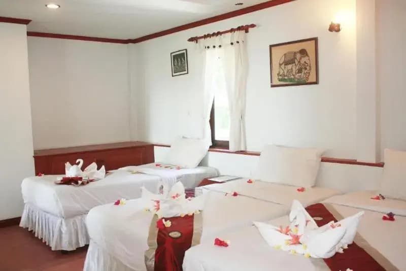 Standard Triple room with balcony and with garden view