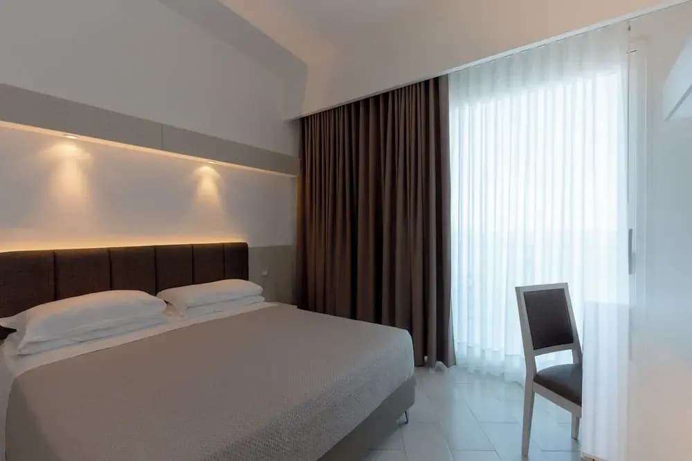 Superior Triple room with balcony and with sea view