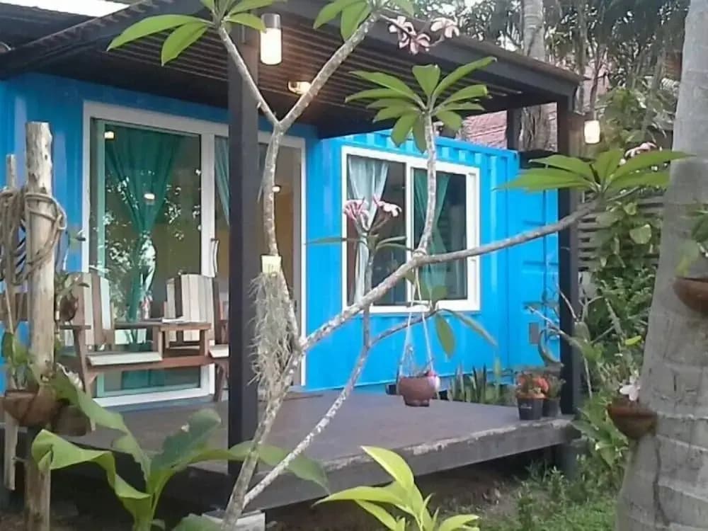 Cottage with balcony and with garden view
