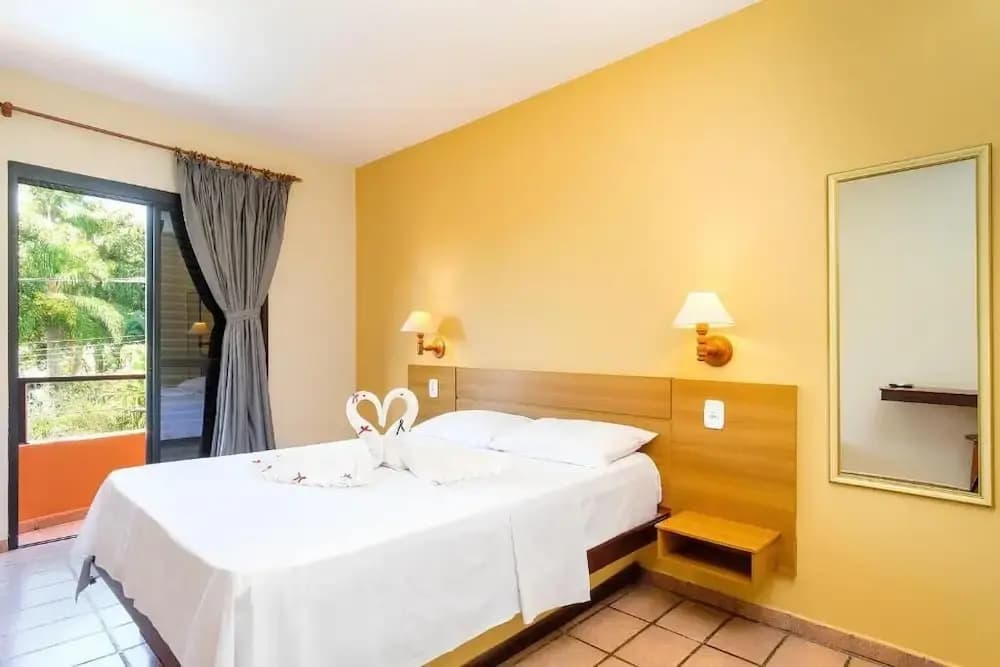 Deluxe Double room with balcony and with pool view full double bed