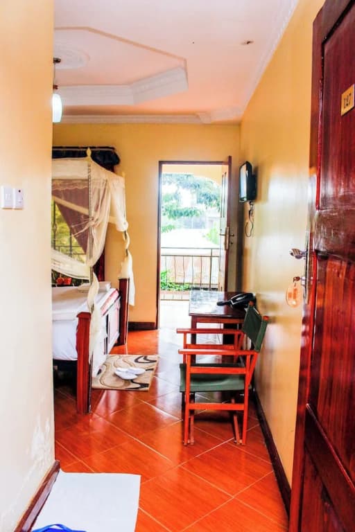 Deluxe Double room with balcony and with garden view full double bed