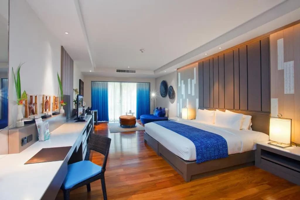 Double Suite with balcony and with pool view full double bed