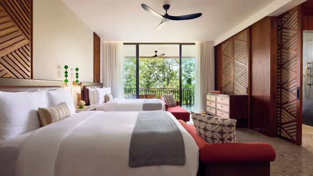 Standard Quadruple room with balcony and with partial ocean view