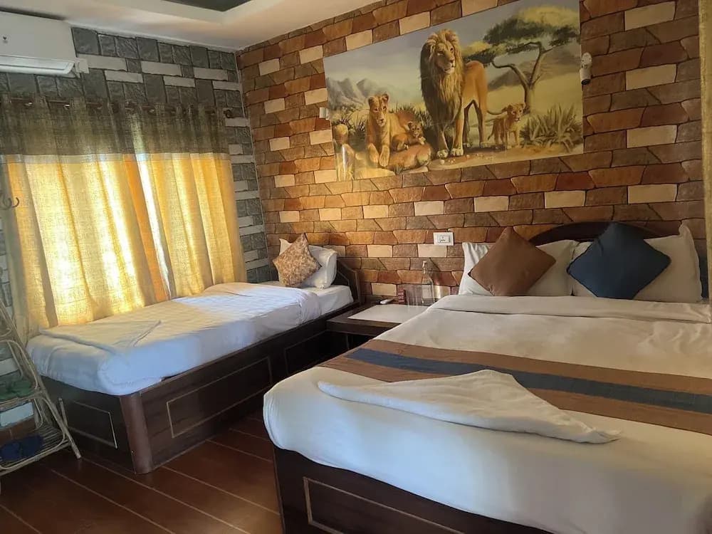 Deluxe Double room with balcony and with garden view full double bed