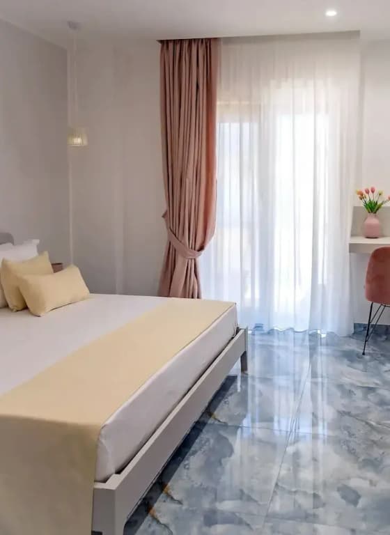 Superior Quadruple room with balcony and with city view