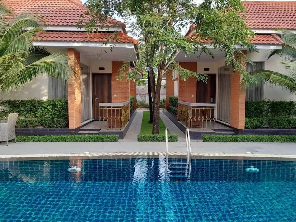 Double Villa with balcony and with pool view full double bed