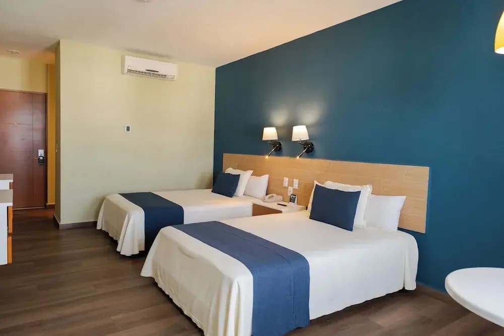 Standard Quadruple room with balcony and with city view