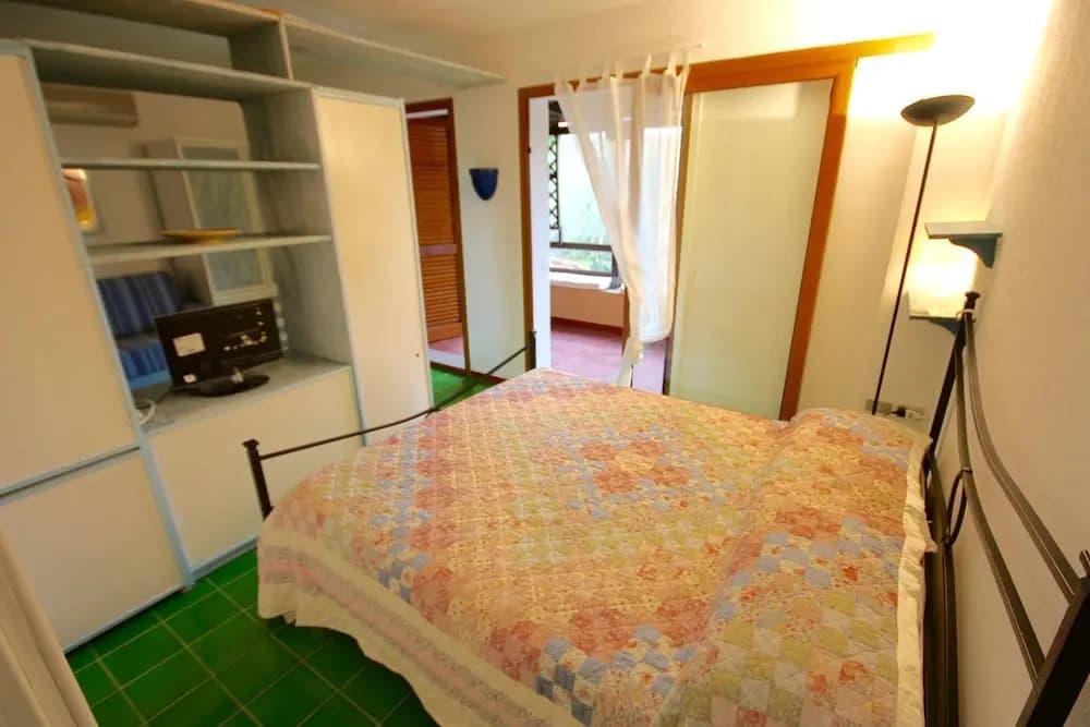 Double Studio with balcony full double bed and sofa