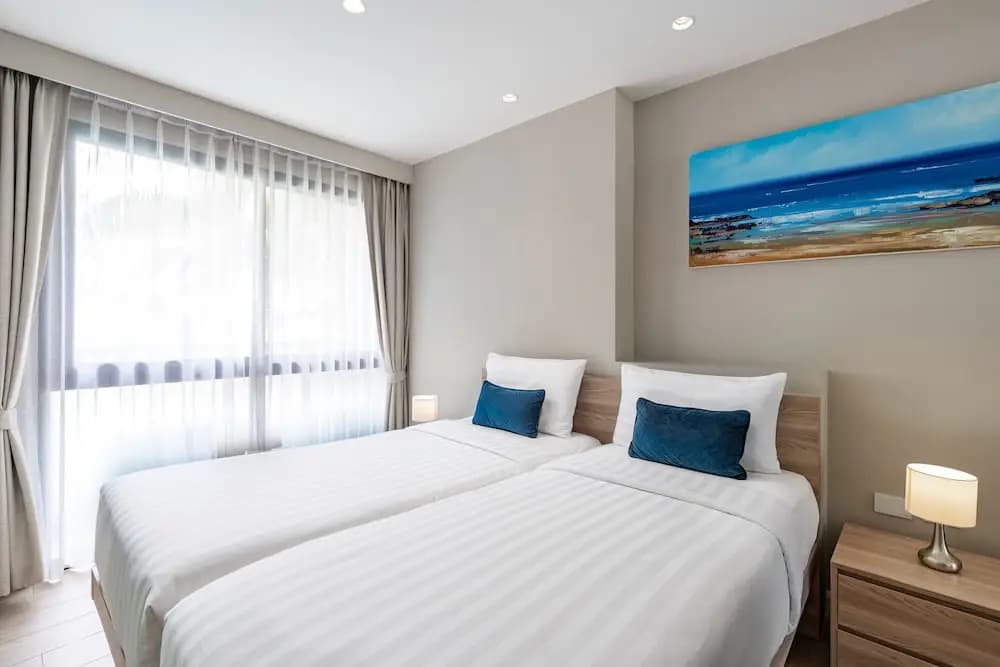 Grand Deluxe Double Suite with pool view twin beds