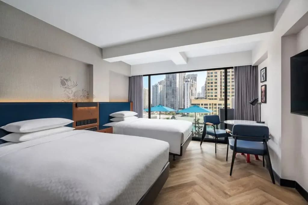 Deluxe Quadruple room with city view