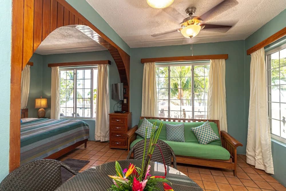 Premier Double Suite with balcony and with partial ocean view full double bed