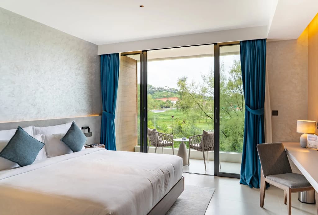 Deluxe Double room with balcony and with garden view full double bed