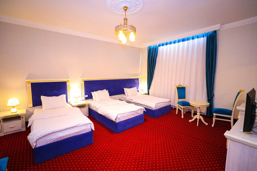Deluxe Triple room with balcony