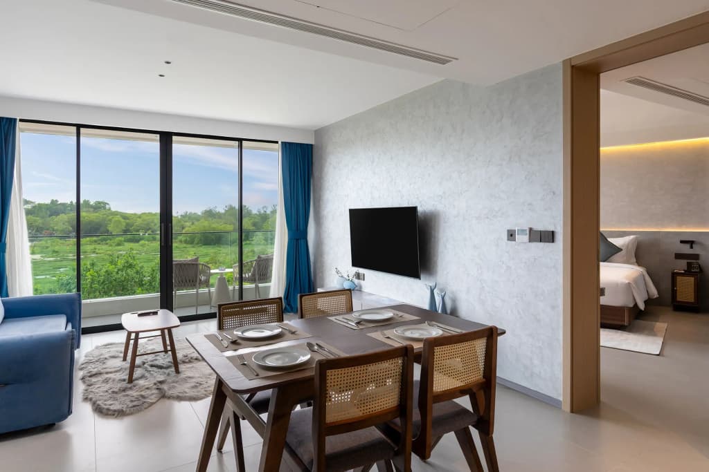 Double Junior Suite with balcony and with garden view full double bed