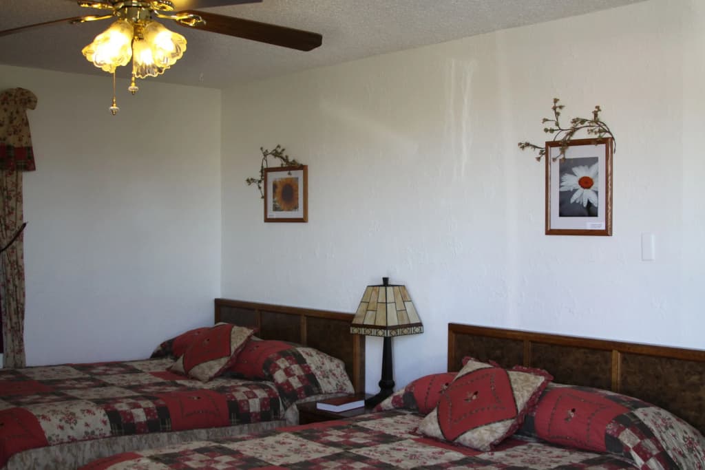 Standard Quadruple room with garden view