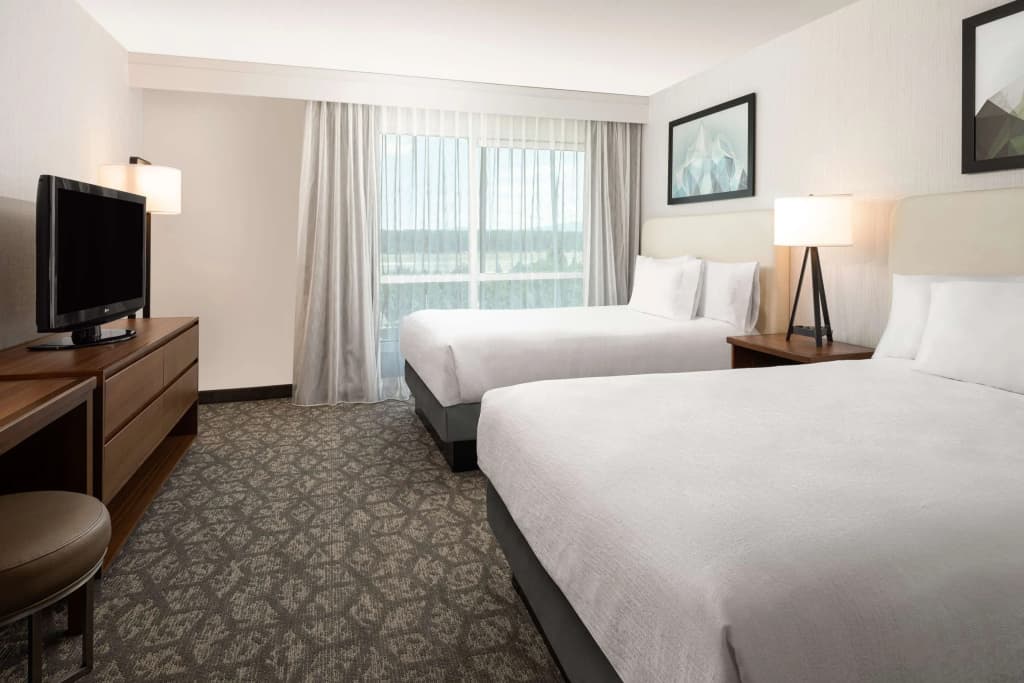 1 Bedroom Mobility/Hearing Accessible with Tub Quadruple Suite