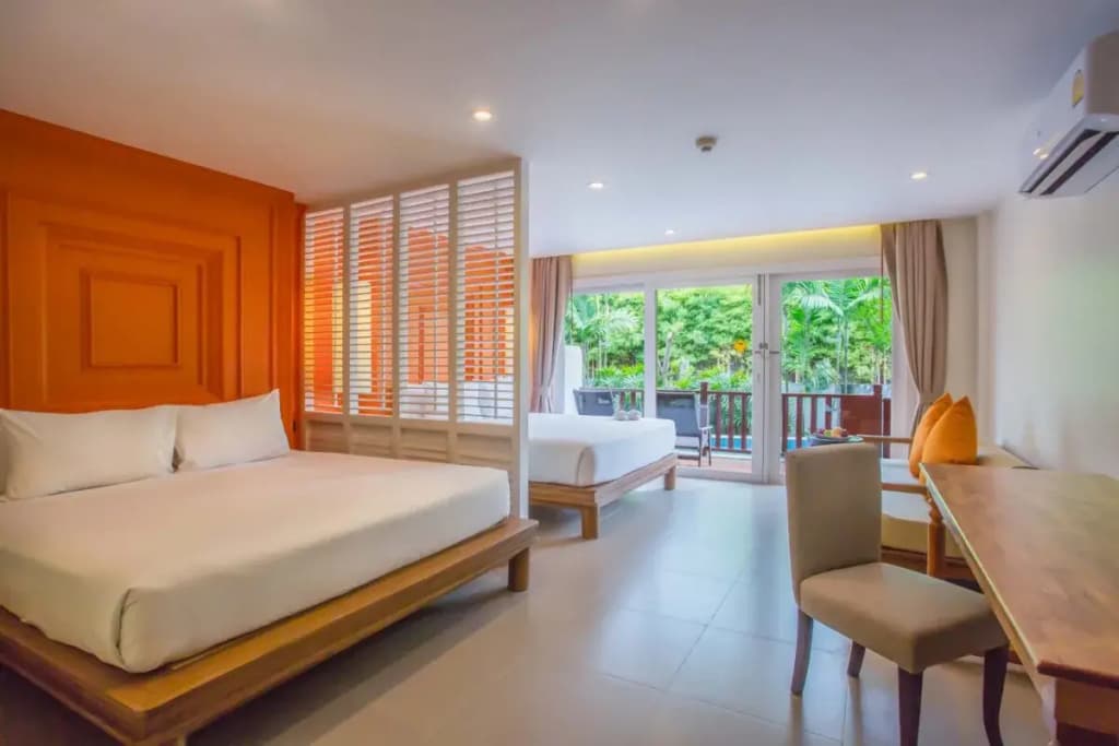 Grand Deluxe Pool Access Quadruple room with garden view