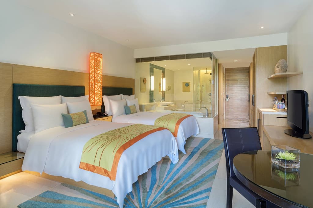 Quadruple room with balcony and with lagoon view