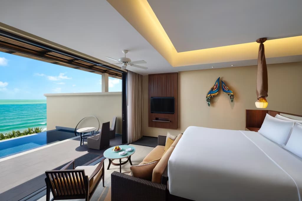 1 Bedroom Premium Ocean Pool Double Suite with ocean view full double bed