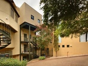 W 6th St Penthouse with City Views by RedAwning