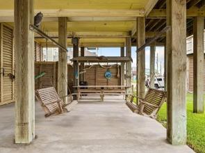 Barefoot Steps To The Beach 4 Bedroom Home by RedAwning