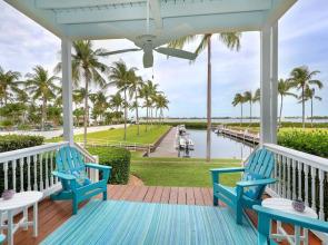 Waterfront Luxury Villa With Sunset Views And Boat Slip 3 Bedroom Townhouse by RedAwning