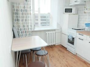 Happy Matryoshka doll on Voskresenskaya street 7