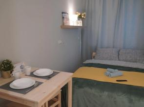 Sofa and Suitcase on the st. Serafimovich, 1/4