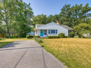 Traverse City Home w/ Fire Pit, Patio + Yard!