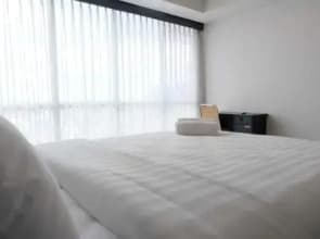 1BR Apartment with Sofa Bed at The H Residence By Travelio