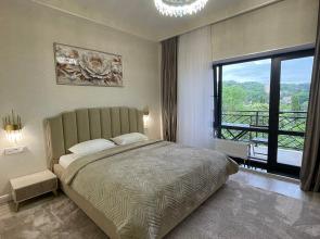 V Tsentre Goroda Apartments