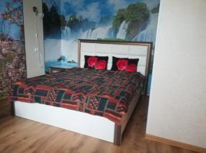 V Tsentre Goroda Apartments