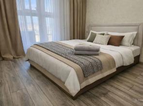 S sovremennym remontom i panoramnym vidom iz okna Apartments