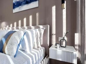 Na ulice Nikolaya Ostrovskogo 195/1 Apartments