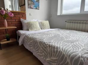 Studiya S vidom na gorod, Vrubelya 15 Apartments