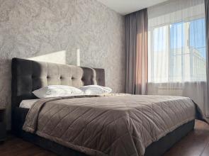 V Tsentre Goroda Apartments