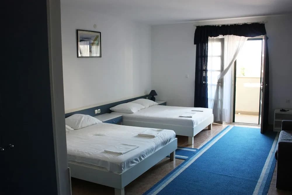 Standard Quadruple room with balcony
