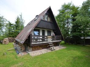 Nice holiday home with fireplace in the Ore Mountains only 500m from the chairlift